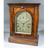 A Victorian walnut cased mantel clock by John Walker, 203 Regent Street, London, the 18ins arched