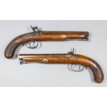 A pair of 18th Century .65 calibre officer's pistols by Nock of London, the 7.5ins browned octagonal