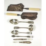 A set of twelve Victorian plated and ivory handled fish knives and forks with silver ferrules,