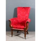 A 19th Century mahogany framed high back easy chair with tapered back and out scroll arms,