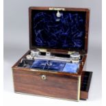 A lady's Victorian brass bound rosewood toilet box, the lid with engraved plaque dated 1858, the