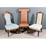 A Victorian walnut framed nursing chair, the scroll moulded frame with scroll carved cresting,