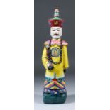 A 20th Century Chinese porcelain standing figure of a court official, enamelled in colours, 15ins (
