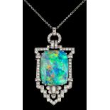 A 1920's silvery coloured metal mounted opal and all diamond set pendant, the rectangular cut opal