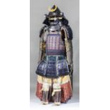 A good Edo period (19th century) Japanese suit of armour (Nuinobe-Do Gusoku) comprising - heavily