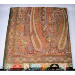 A Kashmiri paisley shawl, 128ins x 60ins