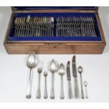 An early 20th Century Dutch silvery metal table service for eighteen place settings, comprising -