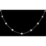 A modern Tiffany platinum and all diamond set necklace, with fifteen collet set brilliant cut