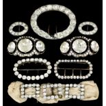 A plated metal and paste set oval buckle, 3ins x 2.25ins, and nine other paste set buckles, various