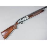 A 12 bore semi automatic three shot shotgun by Breda, serial number 392412, 24.5ins blued steel