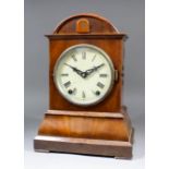 A late 19th Century Continental walnut cased "Cuckoo" clock, the 6ins diameter painted metal dial