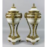 A pair of late 19th century French white marble and gilt metal mounted cassolettes and covers, the