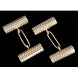 A pair of gentlemen's 9ct gold reeded barrel pattern cufflinks (gross weight 33.6 grammes)