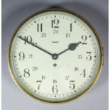 A 20th Century brass cased bulkhead wall clock, the 12ins diameter painted metal 24 hour dial with