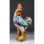 A Chinese porcelain figure of a cockerel enamelled in colours, 14ins (35.6cm) high