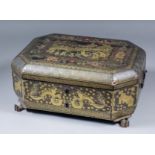 A Chinese black lacquer octagonal workbox decorated in gilt and red with scenes of figures in