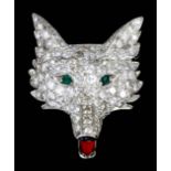 A modern silvery coloured metal mounted diamond and emerald set fox mask pattern brooch, the face