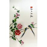 A modern Chinese silk embroidered panel with birds on flowering branches, 13.5ins (34.3cm) x 22.