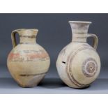 A Cypriot bi-chrome ware jug (oinochoe) painted with concentric circles and crosses, 9.5ins high,