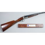A 12 bore side by side shotgun by Gorosable, Serial No. 104958, 28ins blued steel barrels with