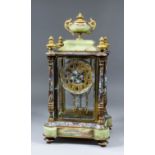 A late 19th/early 20th Century French gilt brass champleve enamel and green onyx "Four Glass" mantel