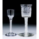 An English 18th Century cordial glass, the plain stem with air twist, on a plain foot, 5.75ins high,
