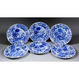 Twelve Chinese blue and white porcelain plates, painted with flowers and leaves, 9.75ins (24.8cm)