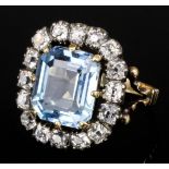 A Continental 18ct gold mounted aquamarine and diamond ring, the rectangular cut aquamarine of