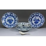 A pair of Chinese blue and white porcelain plates, the centres decorated with a vase of flowers,