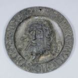 A mid-15th/early 16th Century German or Low Countries lead plaque modelled as the severed head of St