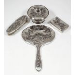 A Chinese silvery metal part dressing table set cast in relief with chrysanthemums, comprising, -