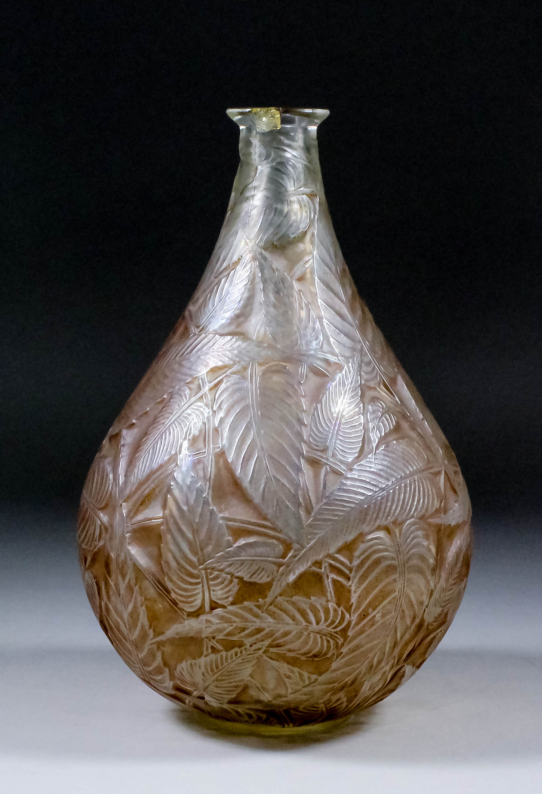 A Lalique glass "Sauge" vase, the body moulded and frosted with interlocking leaves, 10ins high (
