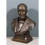 An early 20th Century French green-brown patinated bronze bust of J.N. Monrocq (1819-1913), on