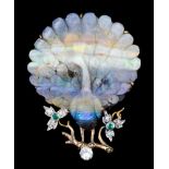 An early 20th Century gold coloured metal mount doublet opal set peacock pattern brooch, the stone