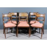 A set of six George III mahogany dining chairs with deep moulded rectangular crest rails, moulded