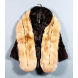 A lady's dark brown mink jacket with three-quarter length sleeves, lined, size 10-12, 25ins long,