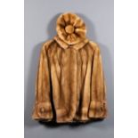 A lady's blonde mink jacket, size 10-12ins, length 29ins, and matching beret