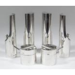 An Elizabeth II plain silver cylindrical six piece condiment set by Paul Harrison, London 1971,