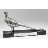 A George V silver model of a pheasant, 11.75ins overall x 5.5ins high, by Jones & Son, London