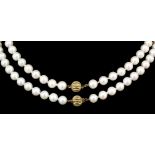 Two modern single strands of cultured pearls, each with 9k gold ball pattern clasp, 440mm and