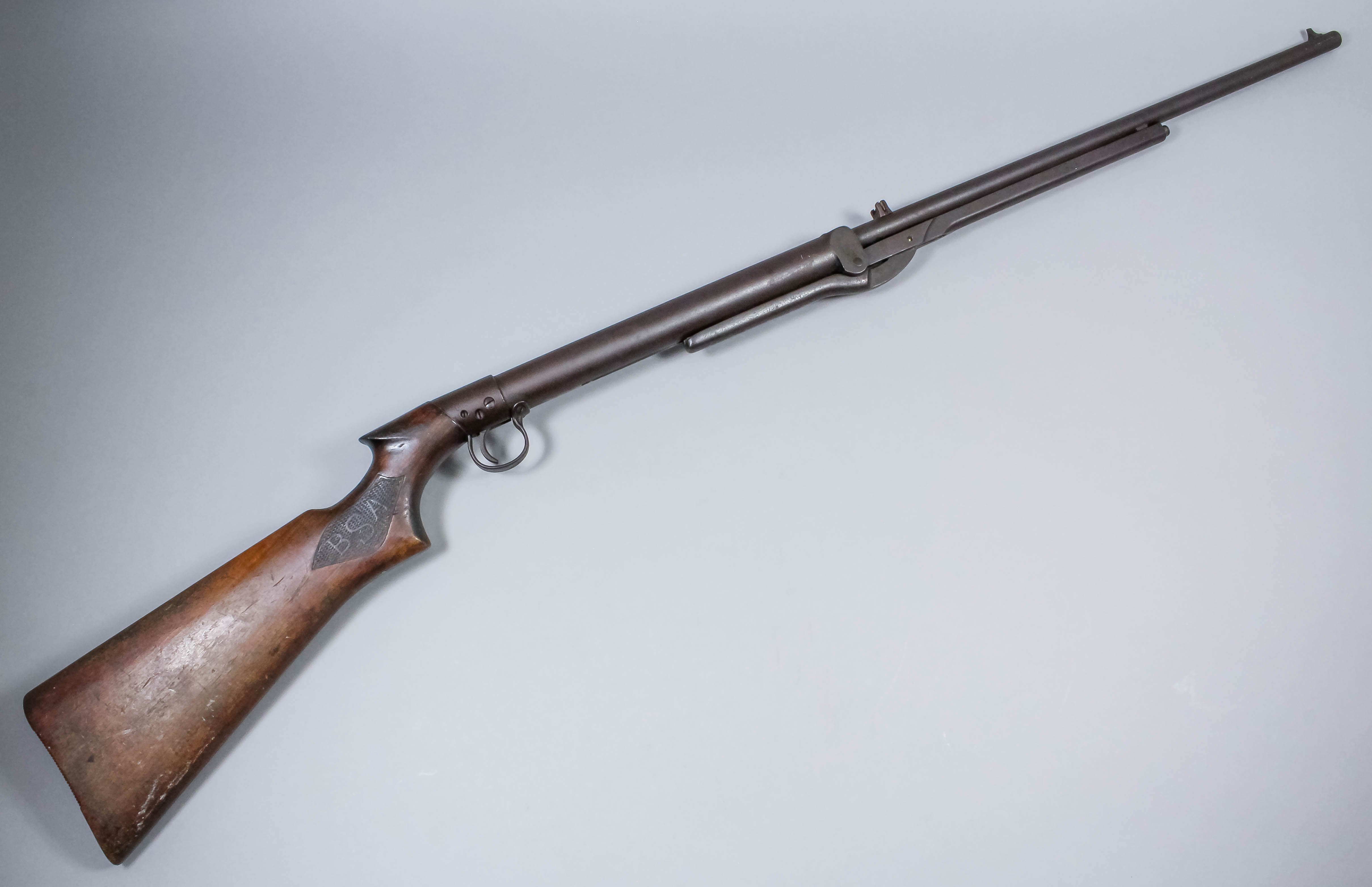 An early 20th Century .22 caliber underlever air rifle by BSA, Serial No. 49793, 19ins barrel with