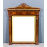 A William IV rosewood and gilt framed rectangular wall mirror of "Architectural" design, with scroll
