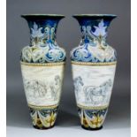 A pair of late 19th Century Doulton Lambeth stoneware baluster-shaped vases by Hannah Barlow, the