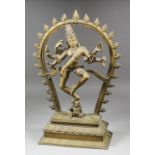 A cast brass Hindu figure of Shiva Nataraja, Lord of Dance, 25ins (63.5cm) high