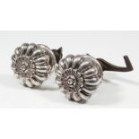 An unusual pair of William IV cast silver coach handles of bulbous reeded form and cast with