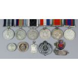 Eleven World War I and World War II medals and badges, comprising George V Australia Service Medal