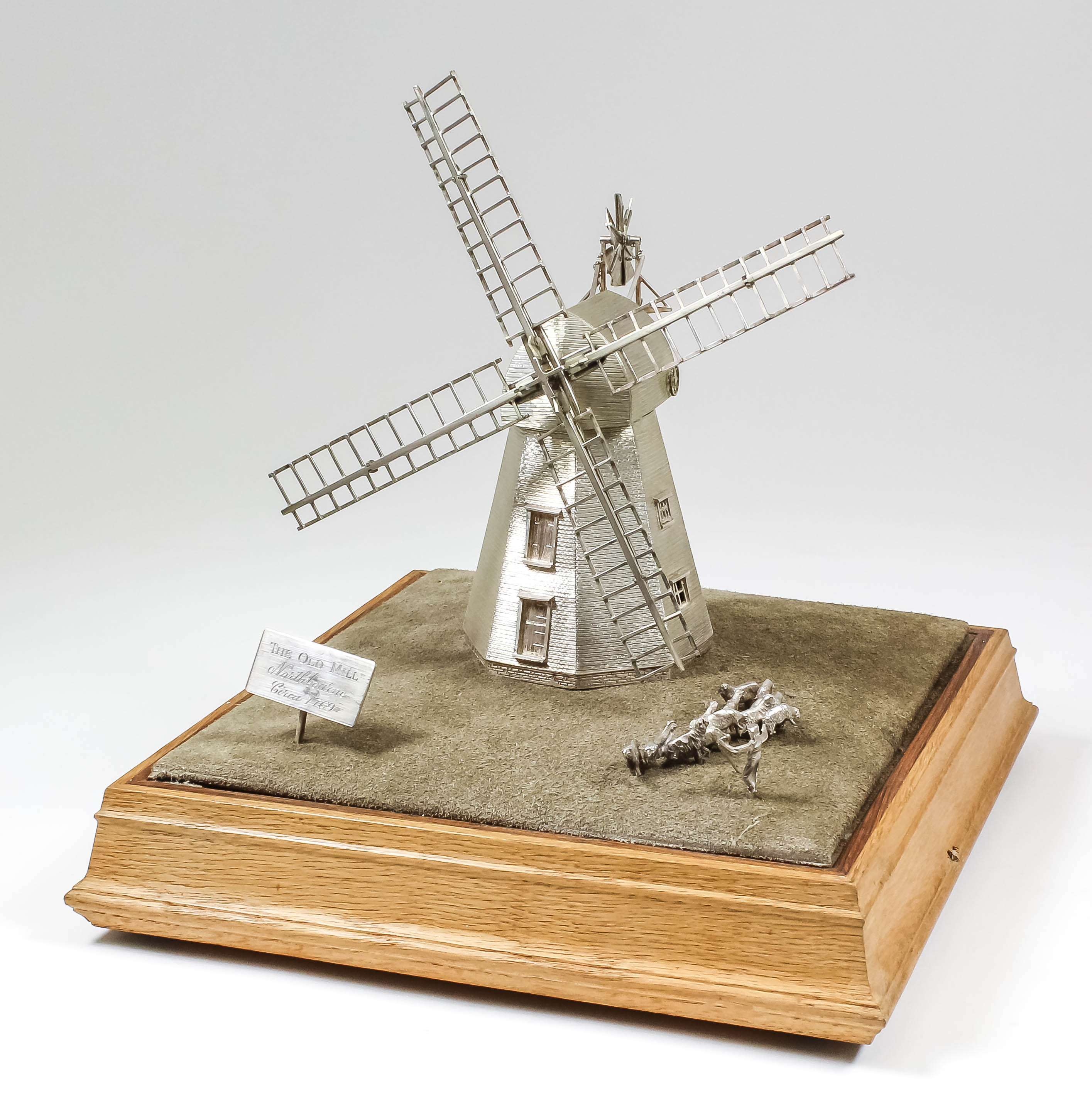 A good Elizabeth II silver model of a windmill - "The Old Mill, Northbourne circa 1769", 7.75ins