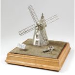 A good Elizabeth II silver model of a windmill - "The Old Mill, Northbourne circa 1769", 7.75ins