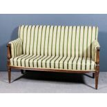 A 19th Century mahogany framed three seat settee of "Louis XVI" design, upholstered in green and