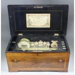 A late 19th Century Swiss eight air musical box with 13ins cylinder, six bells, drum and castanet in